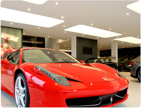 image of a Ferrari dealership with lighting fitted by Total Lighting